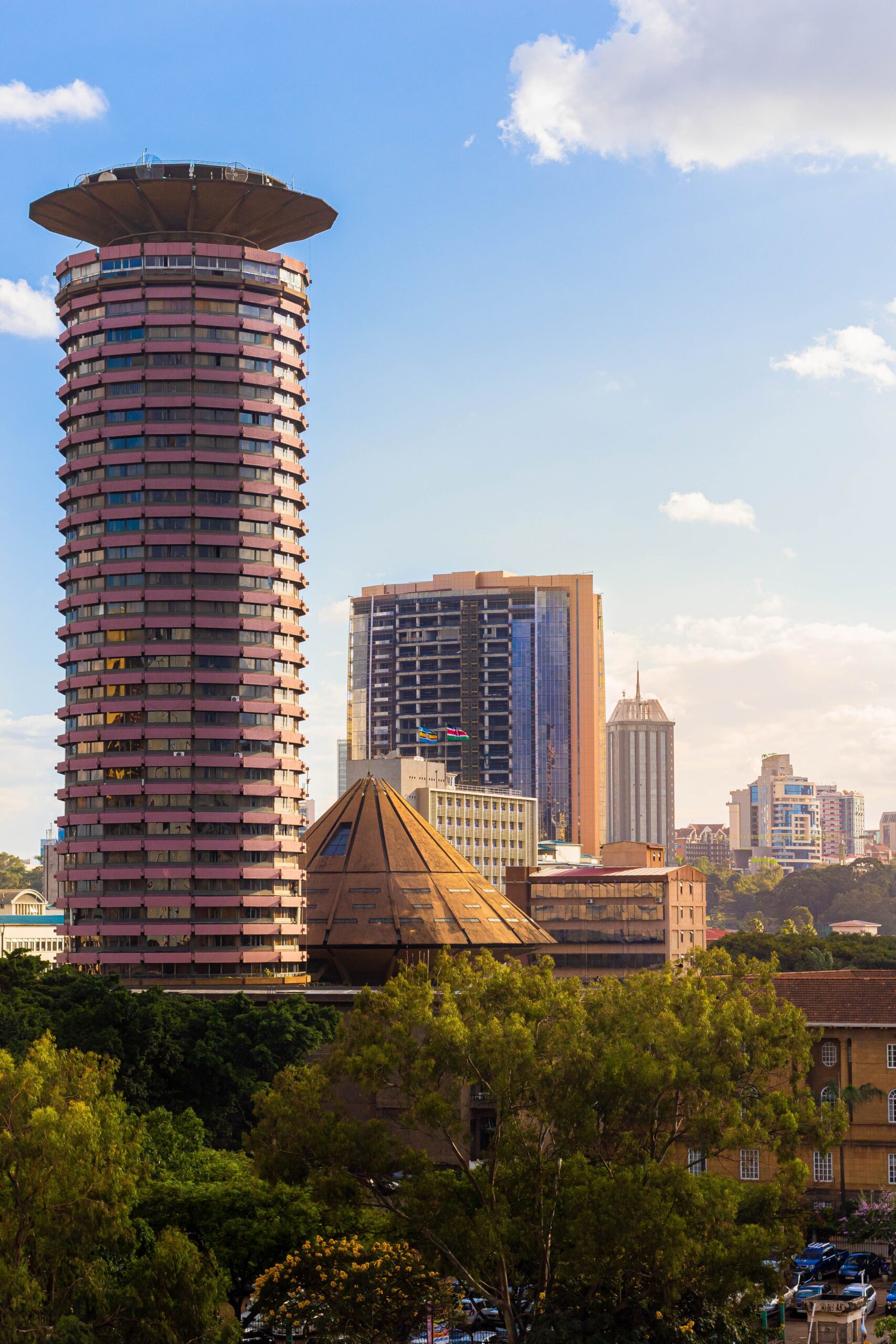Skyline of Nairobi featuring the iconic Kenyatta International Conference Centre, showcasing urban architecture.
